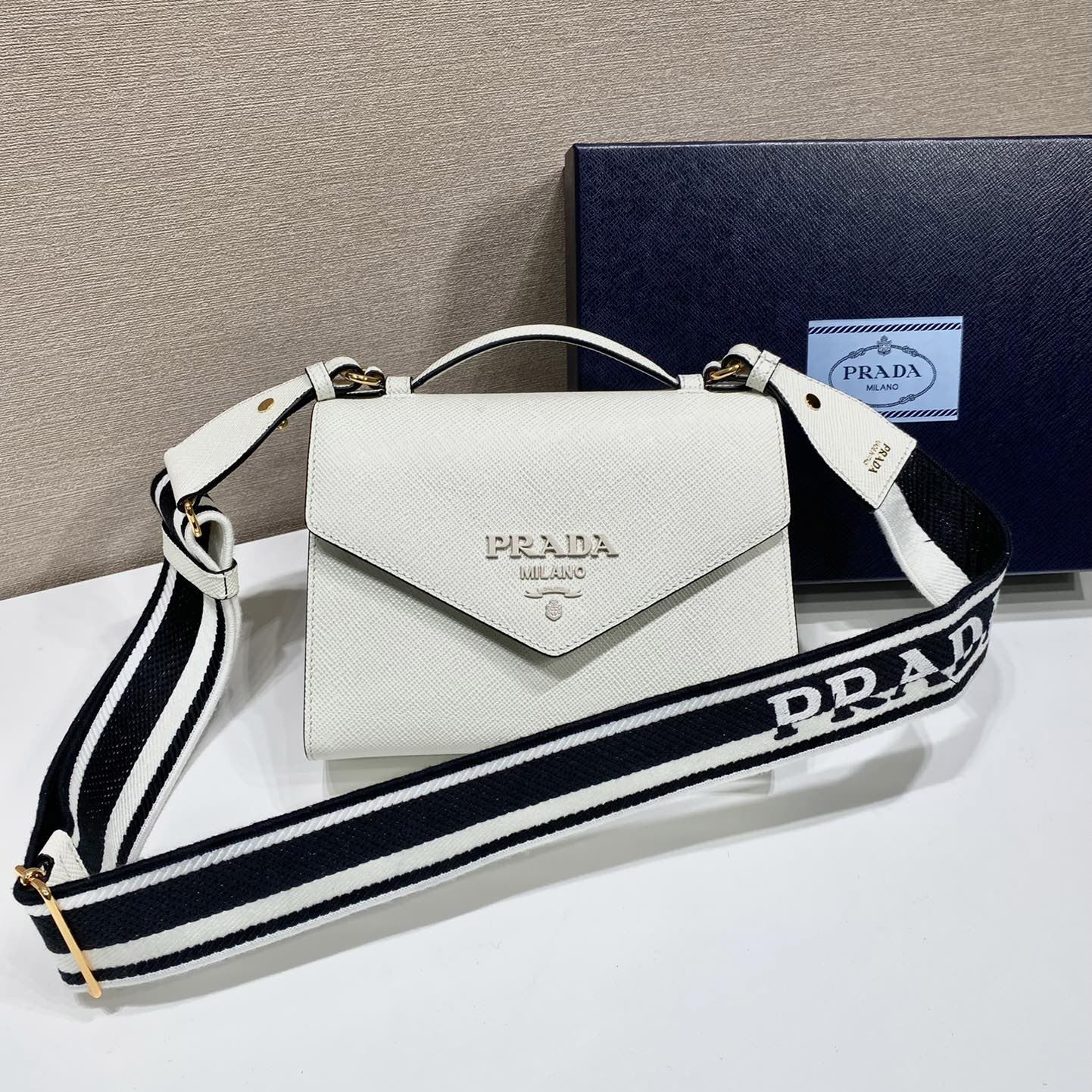 Pra*a top handle bags